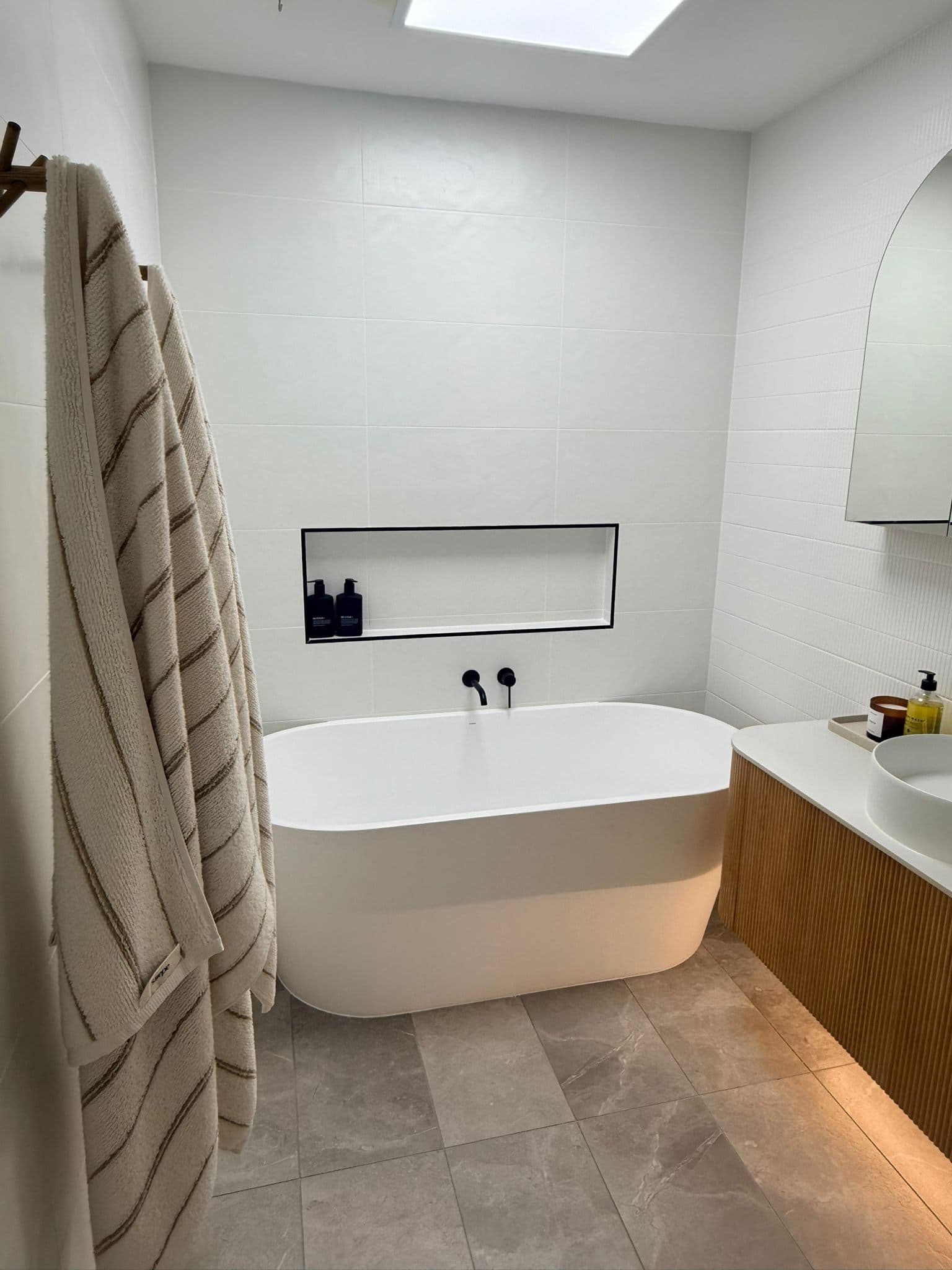 Finished Chirnside Park bathroom with freestanding bath and niche